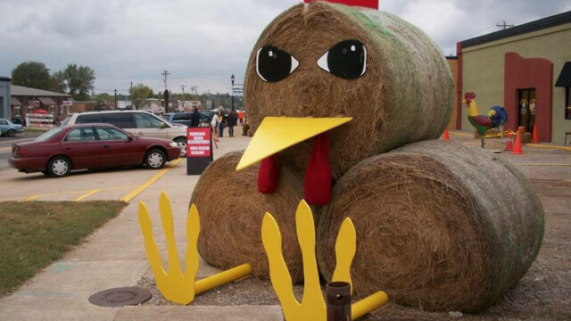 chicken sculpture made from hay bales